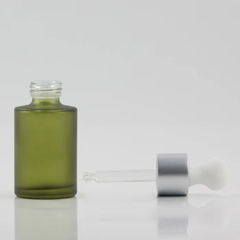 Търговия на едро стъклена бутилка с капачка-капкомер 30 мл кръгла опаковка от матово зелено стъкло
